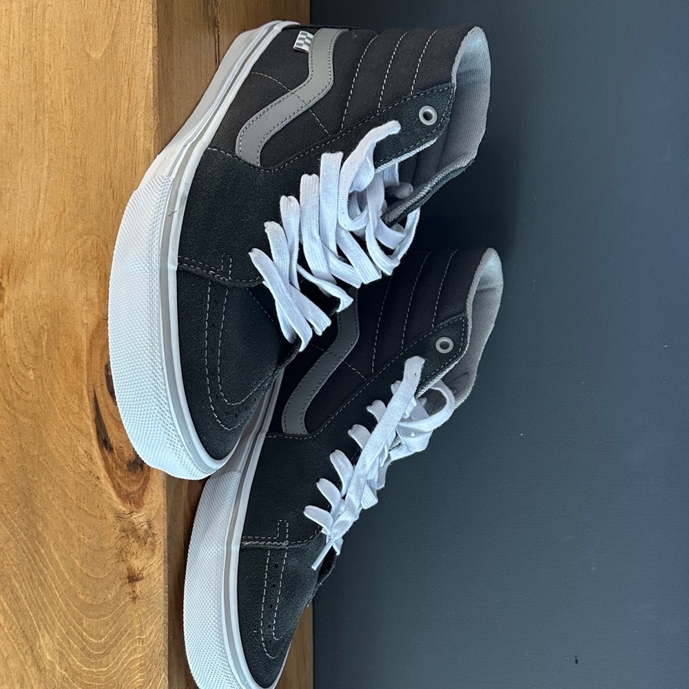 Vans Black and White High-Top Sneakers